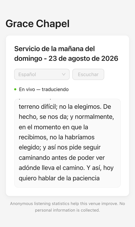 A phone showing the Spanish translation of a service, with live captions.